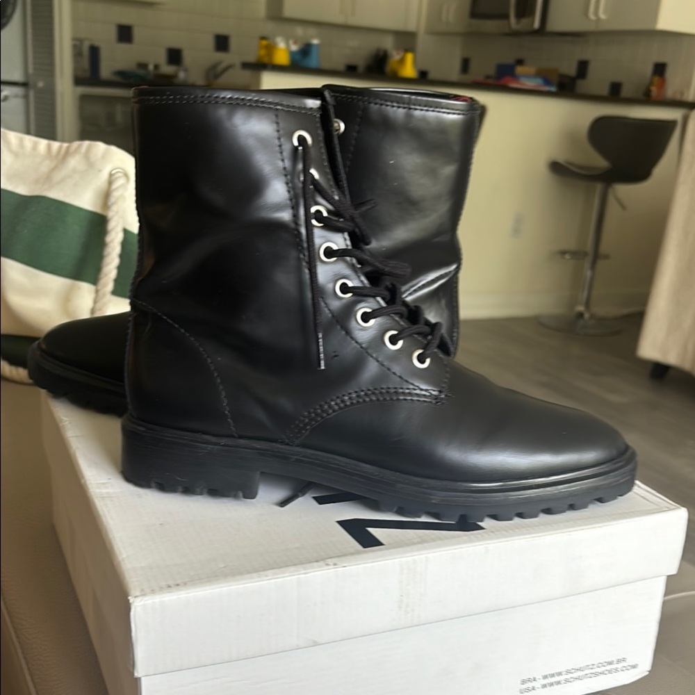 Black Leather Combat Boots with Lace-Up Design